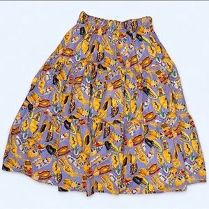 Tiered circle skirt with Mexican designs.